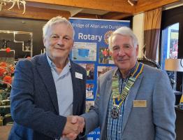 Club Handover 2025  Past President Peter with President 2025-26 Alastair McPherson (right)